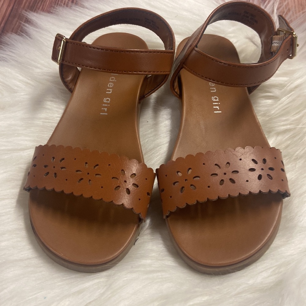 Brown Sandals with Floral Cutouts 
Brand Madden Girl